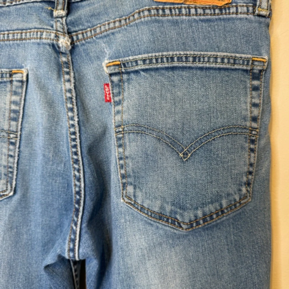 Levi’s 511 Perfect Medium Wash Thrashed Distressed High Rise Slim Tapered Jeans